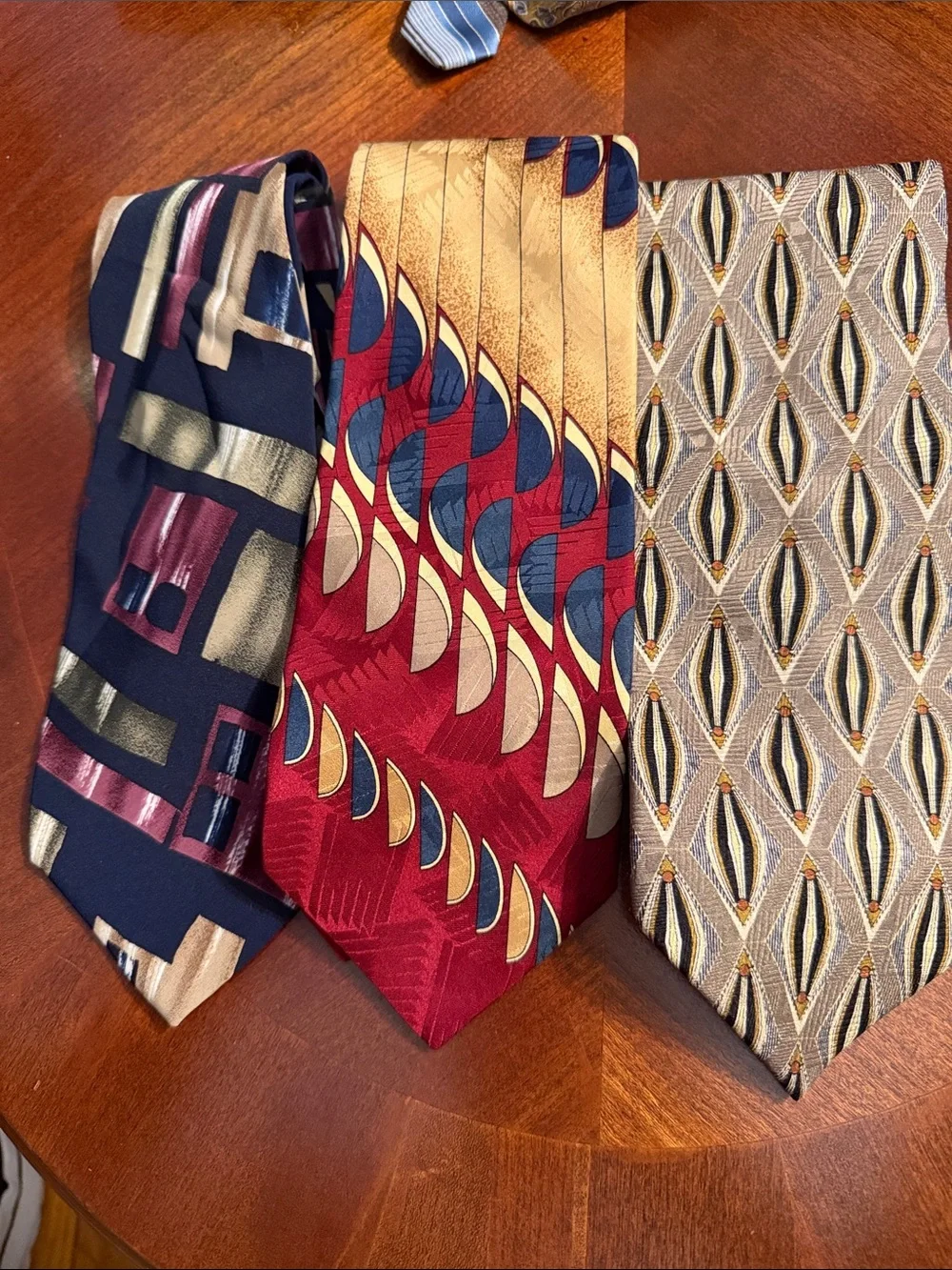 Three-Tie Set - multi colored, multi-patterned.